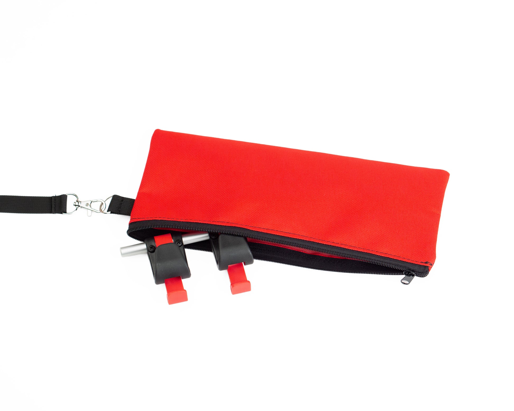 Abnehmbare Tasche  von Spleen Berlin zum aufbewahren von dem Fahrradsystem und anderen Gegenständen z.B Handy. Befestigt an einem Schlüsselband zum abnehmen mit Karabiner für Rolltop Rucksack Bob-Red Glow. © Spleen Berlin